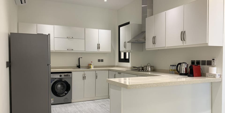Design Apartment, 3 Bedrooms | Private kitchen | Electric kettle, eco-friendly cleaning products, paper towels