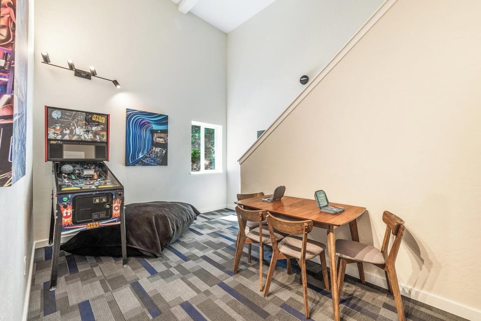 Game Room: Pinball, futon, video game table, board games, Smart TV (West Wing).