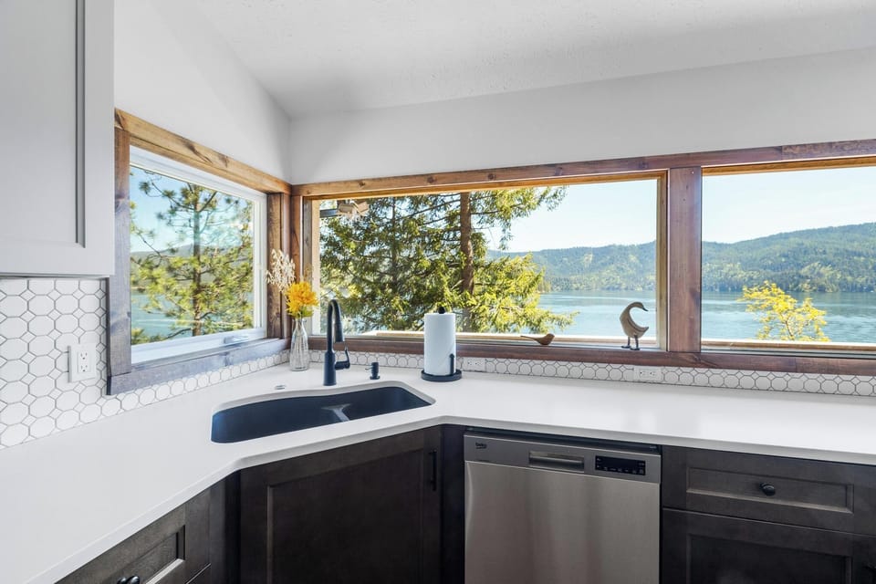 Spacious, fully stocked with island, bar seating, and ample storage (East Wing).