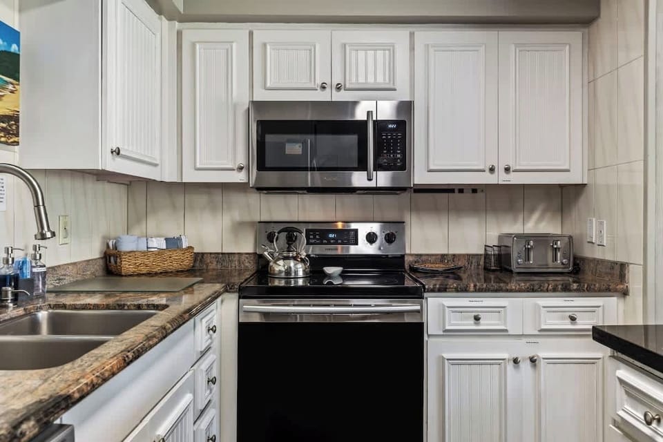 Fully equipped kitchen features stainless appliances
