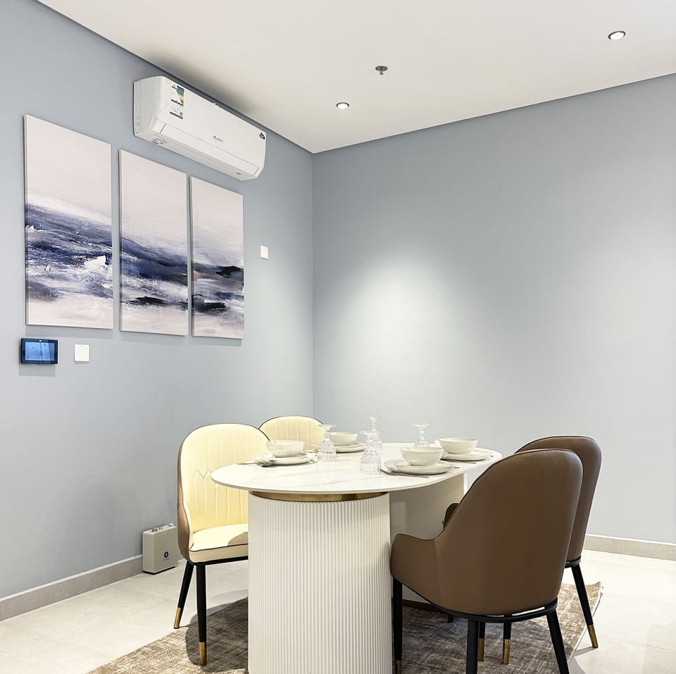 Design Apartment, 3 Bedrooms | Living area | Flat-screen TV