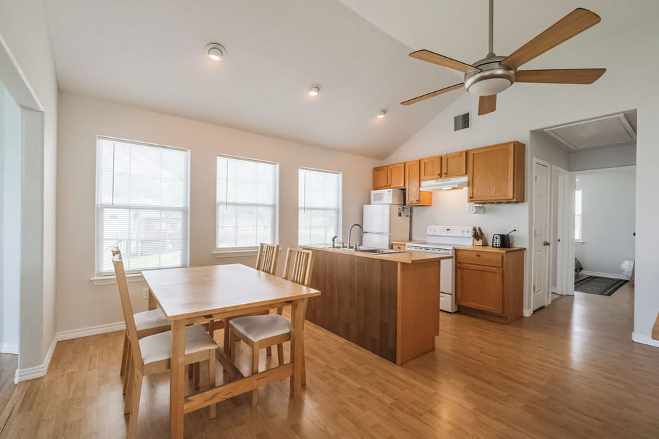 Kitchen and dining area with lake views.