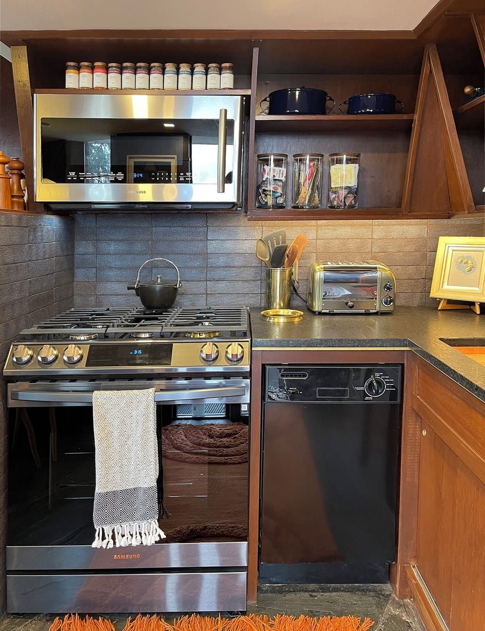 The kitchen features a microwave, gas stove w/ optional griddle and dishwasher.