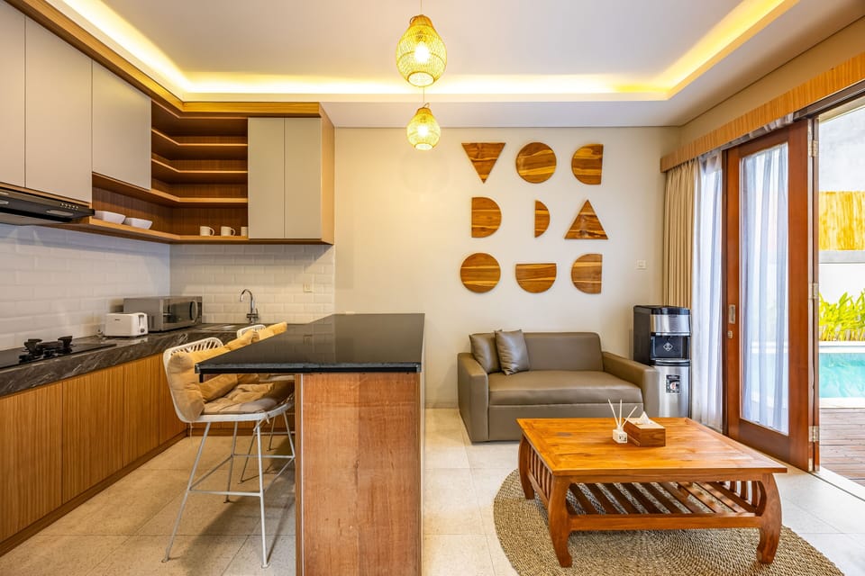 Villa, Pool View | Living area | 32-inch LCD TV with digital channels