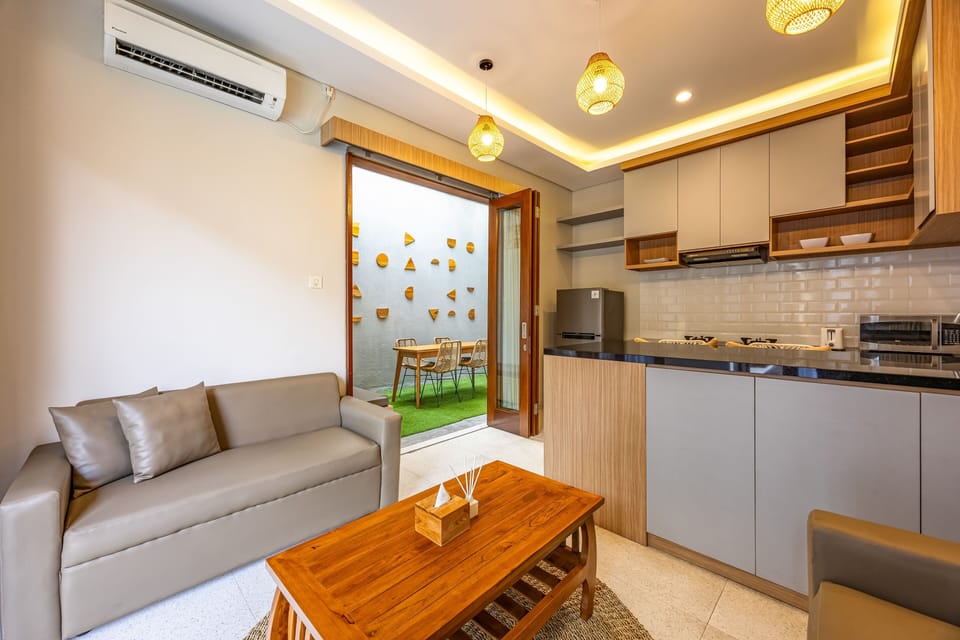 Villa, Pool View | Living area | 32-inch LCD TV with digital channels