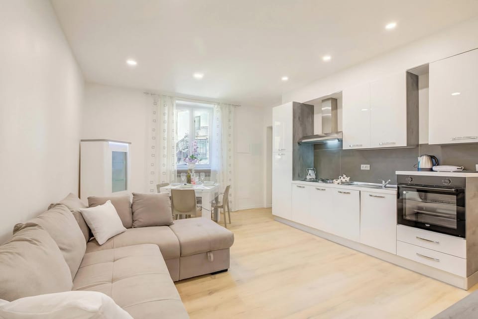 Family Apartment, Multiple Bedrooms (Patty New Apartment in Laveno Center) | Living area | Flat-screen TV