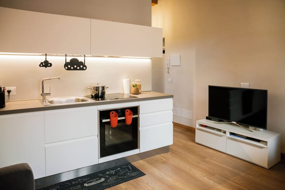 Apartment | Private kitchen | Full-size fridge, oven, dishwasher, cookware/dishes/utensils