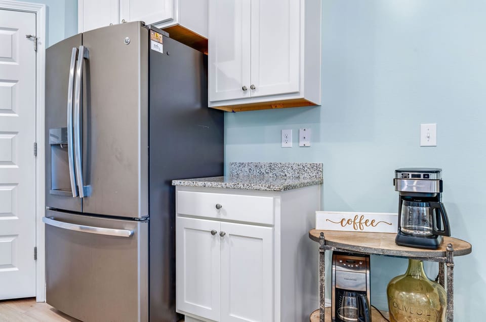Designated coffee bar with pantry for storage