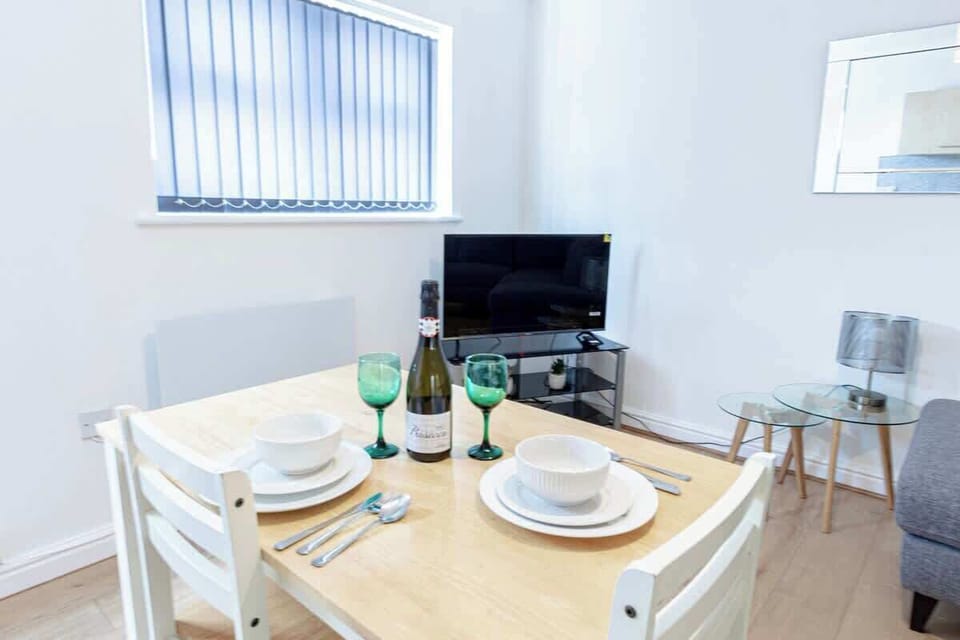 Our dining area is inviting. A complete set of dining wares is provided.