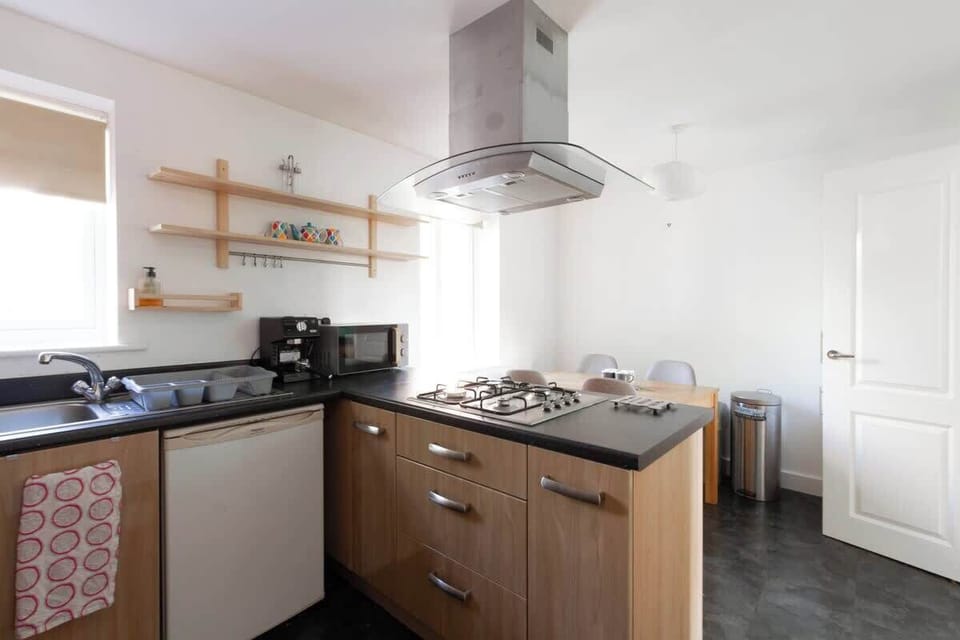Well-equipped kitchen to prepare a home-cooked meal.
