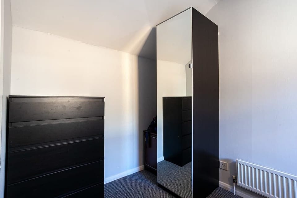 Ample storage for clothing in the cabinet drawers and closet.