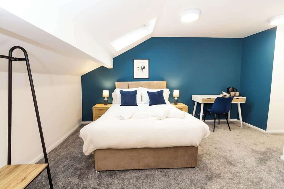 Enjoy this spacious bedroom with built-in cabinets for your clothes and essentials