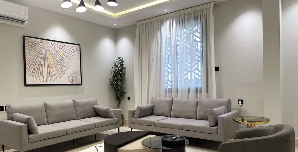 Design Apartment, 3 Bedrooms | Living area | Flat-screen TV