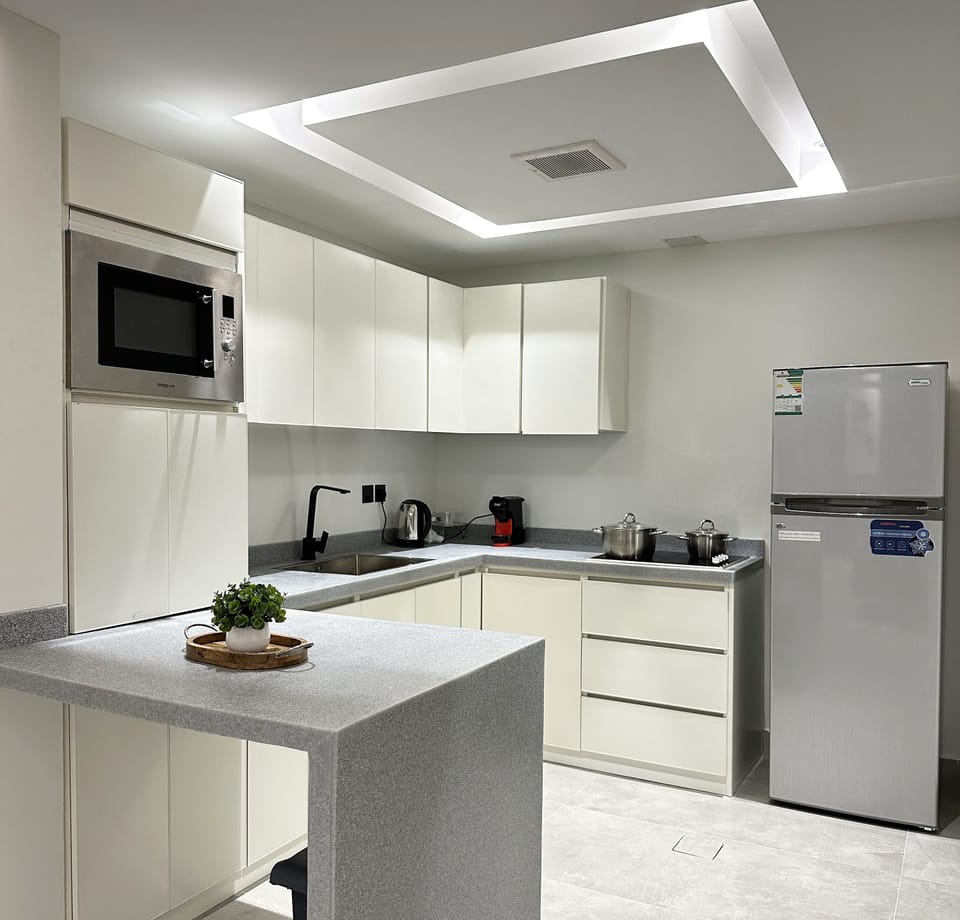 Design Apartment, 3 Bedrooms | Private kitchen | Electric kettle