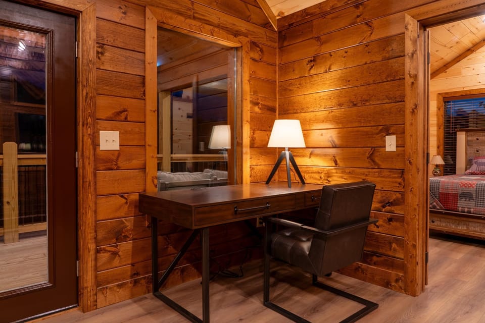 Upstairs loft area:
Workspace with office desk and chair.
Sitting/reading area. 