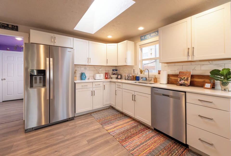 Beautiful white cabinets & quartz countertops. All new Whirlpool appliances.