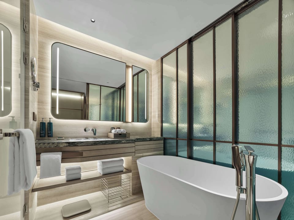 Rainfall showerhead, designer toiletries, hair dryer, bathrobes