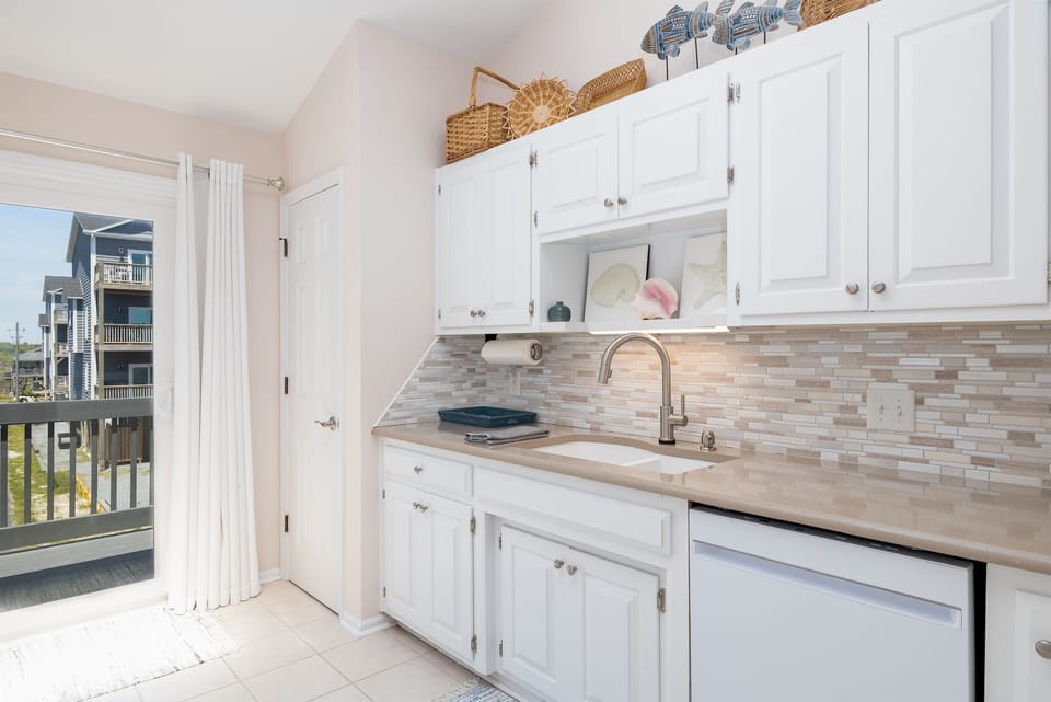 Kitchen sink equipped with touch activated faucet