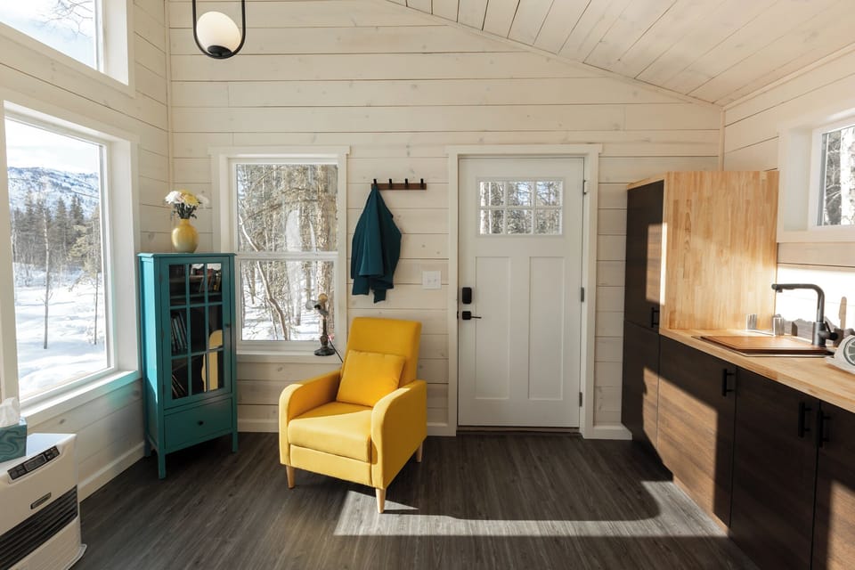 Tiny cabin studio layout living area.