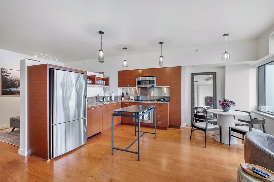 Fully stocked kitchen with stainless steel appliances