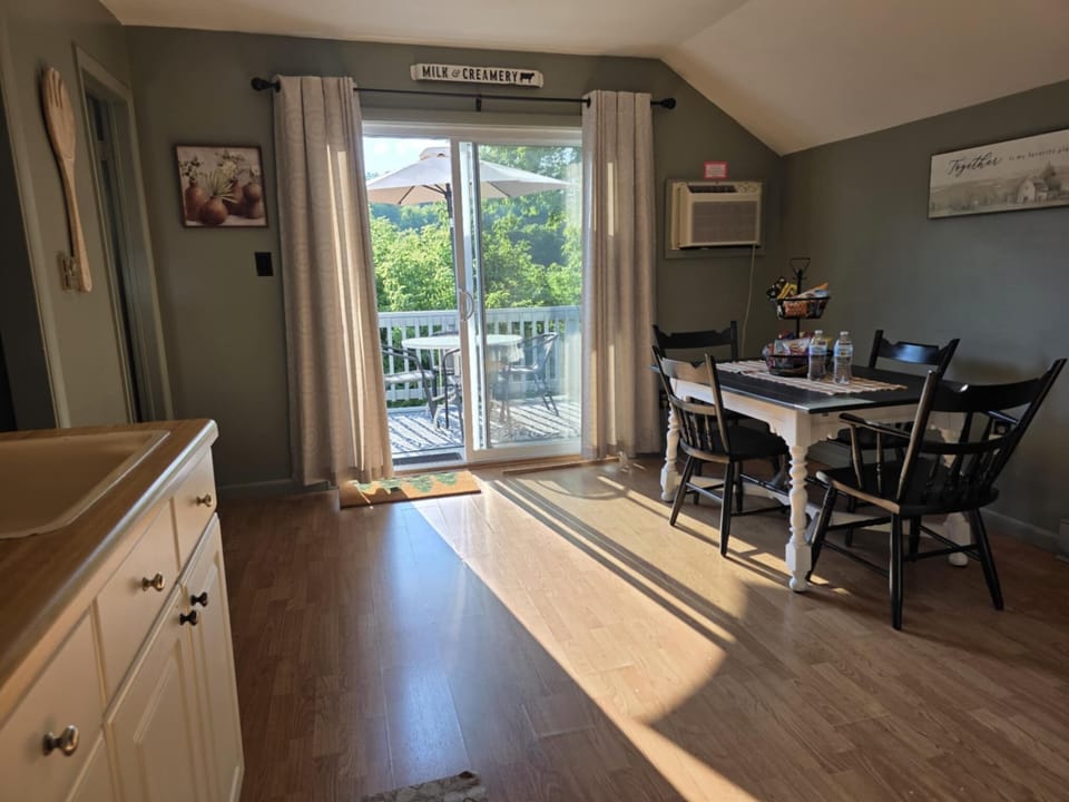 Small deck located off the Kitchen. Stairway to ground level.