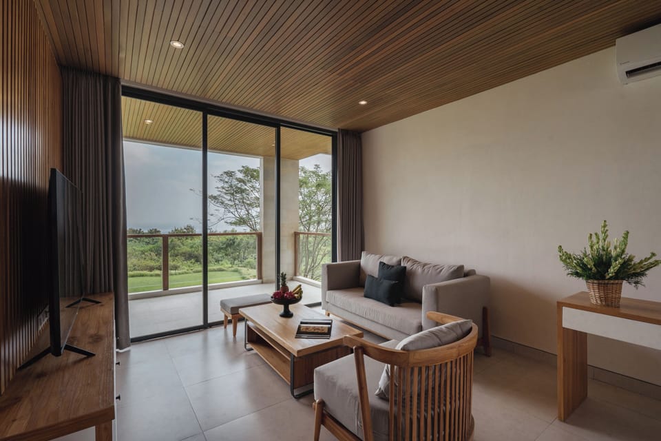 Luxury Suite, 4 Bedrooms | Living room | 85-inch Smart TV with cable channels
