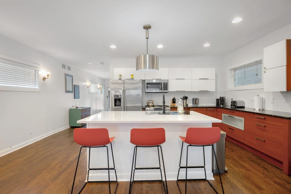 Large, fully-equipped kitchen in the center of the home!