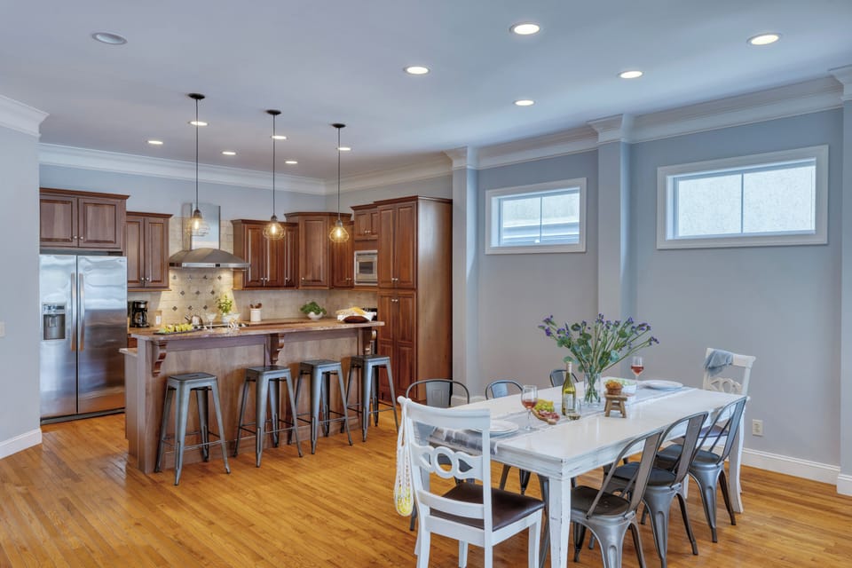 Spacious dining area and sleek kitchen.