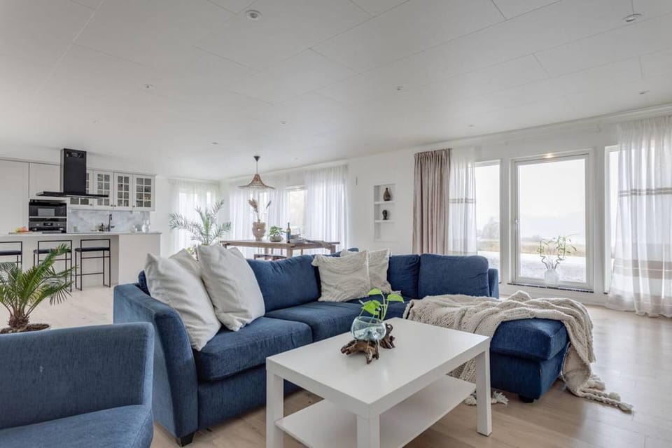 Villa | Living area | TV, fireplace