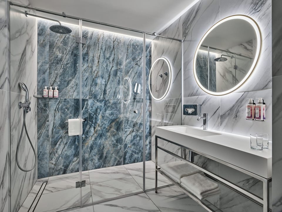 Shower, hydromassage showerhead, hair dryer, bathrobes