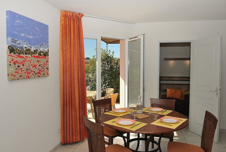 Apartment, 2 Bedrooms | Living area | 60-inch flat-screen TV with cable channels