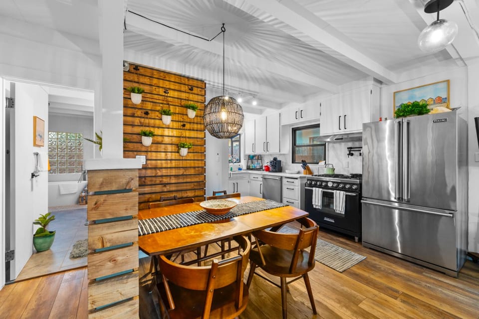 The dining area boasts elegant seating for four. 