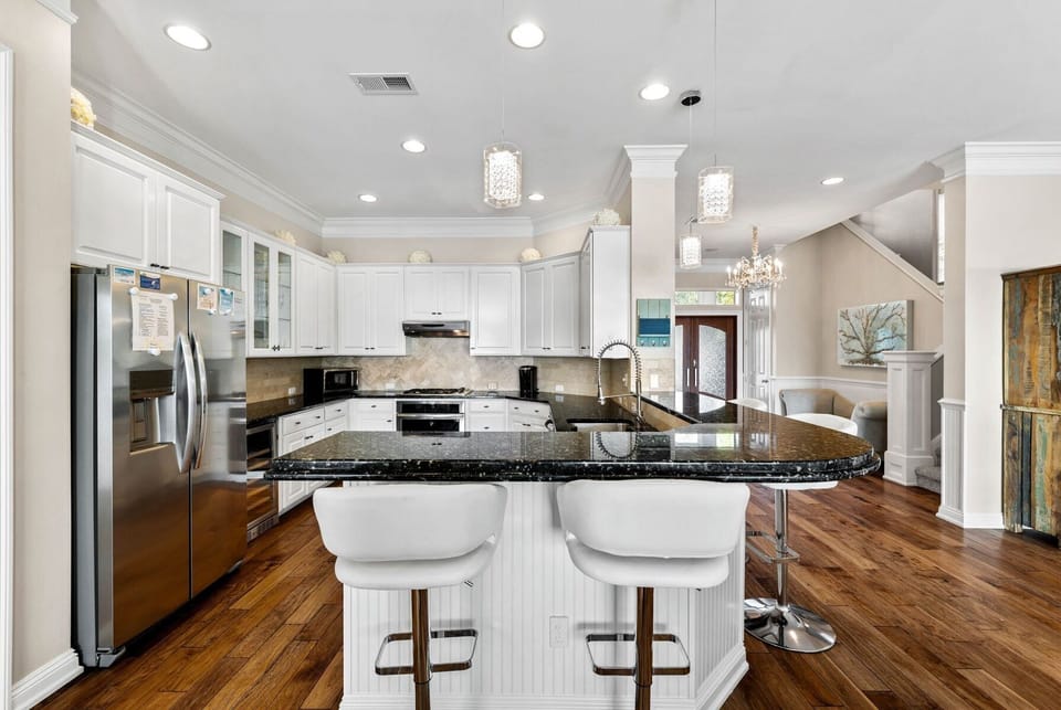 Spacious kitchen countertops with breakfast bar