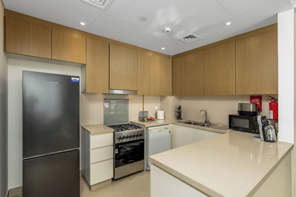 Elite Apartment, Balcony, Sea View | Private kitchen | Fridge, microwave, oven, dishwasher