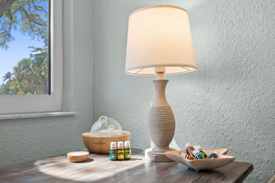 Relaxation Retreat: Bright corner with essential oils and warm lighting to unwind after beach fun!