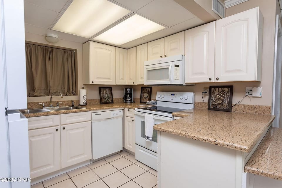 Condo, Multiple Beds (Sunbird 807E) | Private kitchen | Oven, toaster