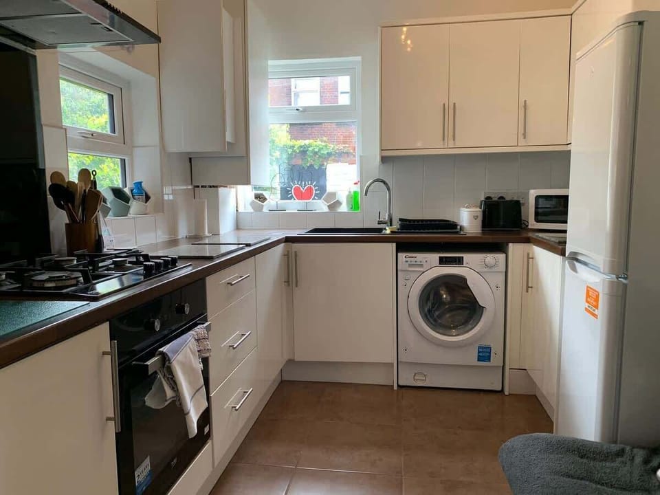 
The kitchen is equipped with modern amenities to meet your culinary needs.