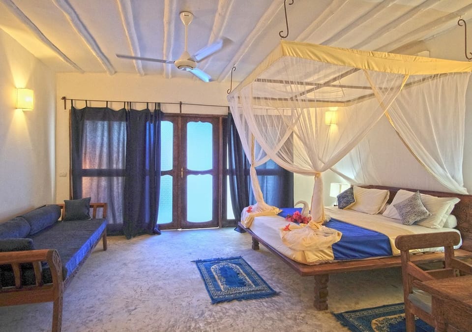 Family Suite, Garden View | Premium bedding, minibar, in-room safe, desk