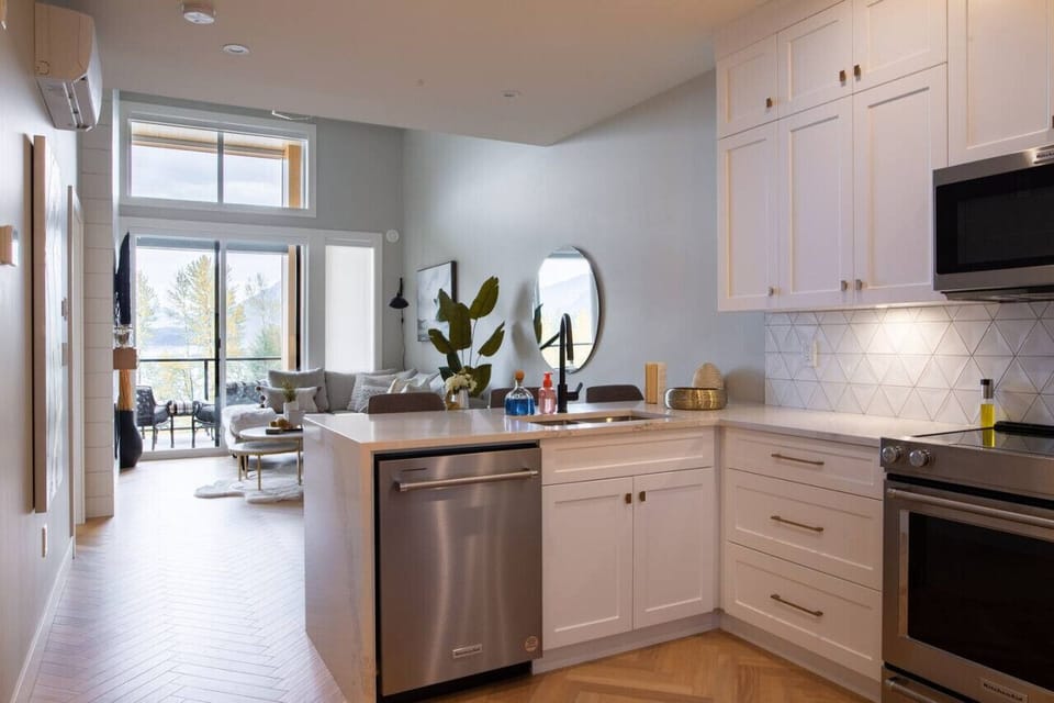 The kitchen opens up to the living room.