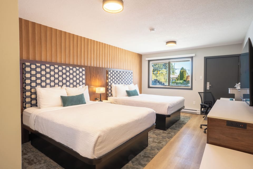 Classic Two Queen Room | Desk, laptop workspace, iron/ironing board, free WiFi