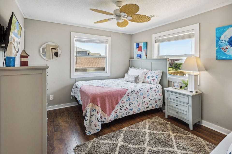 The 4th Queen Bedroom boasts tasteful decor and a Flat Screen TV for your convenience and comfort!