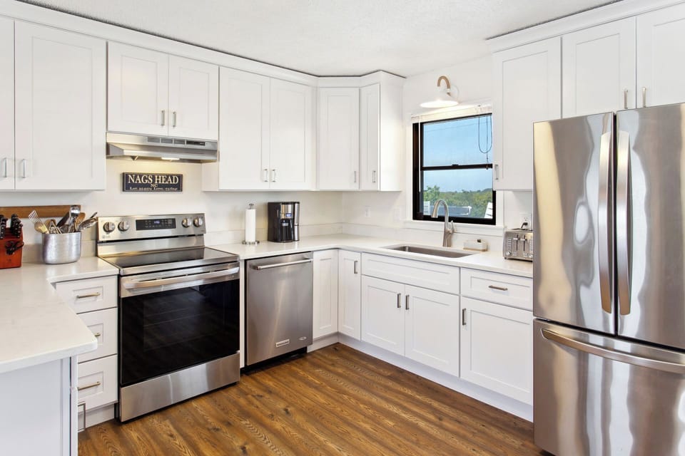 The Kitchen with modern appliances is perfect for whipping up something delicious that the whole family will love.