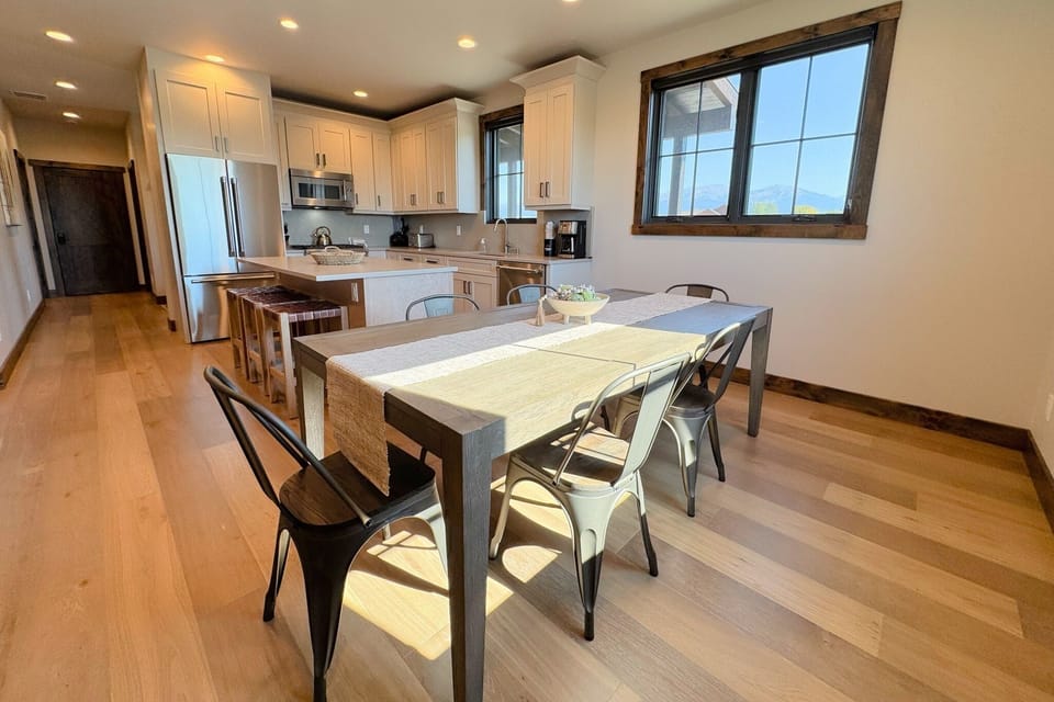 Gather around the dining table for food, conversation, or fun.