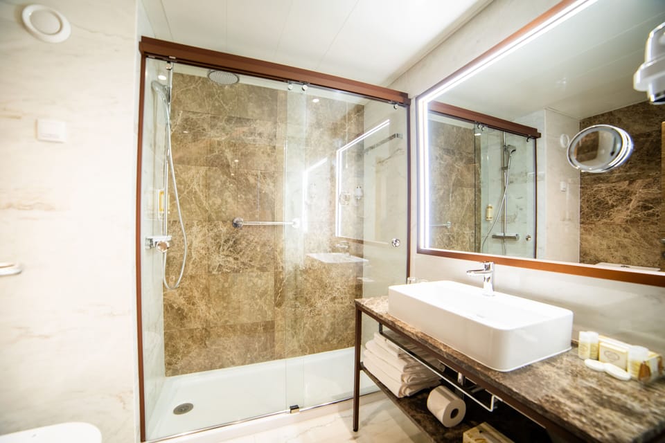 Rainfall showerhead, free toiletries, hair dryer, bathrobes