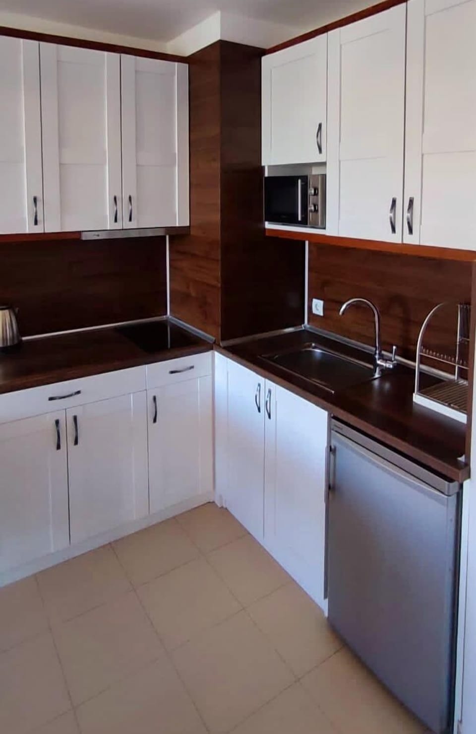 Mini-fridge, microwave, stovetop, electric kettle