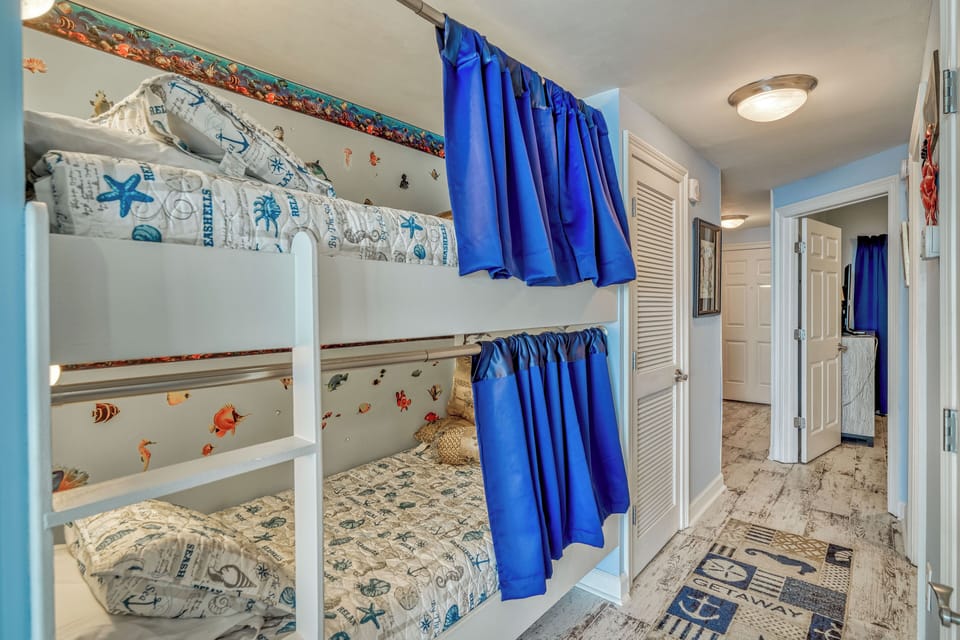 Twin size bunks in the hallway nook.