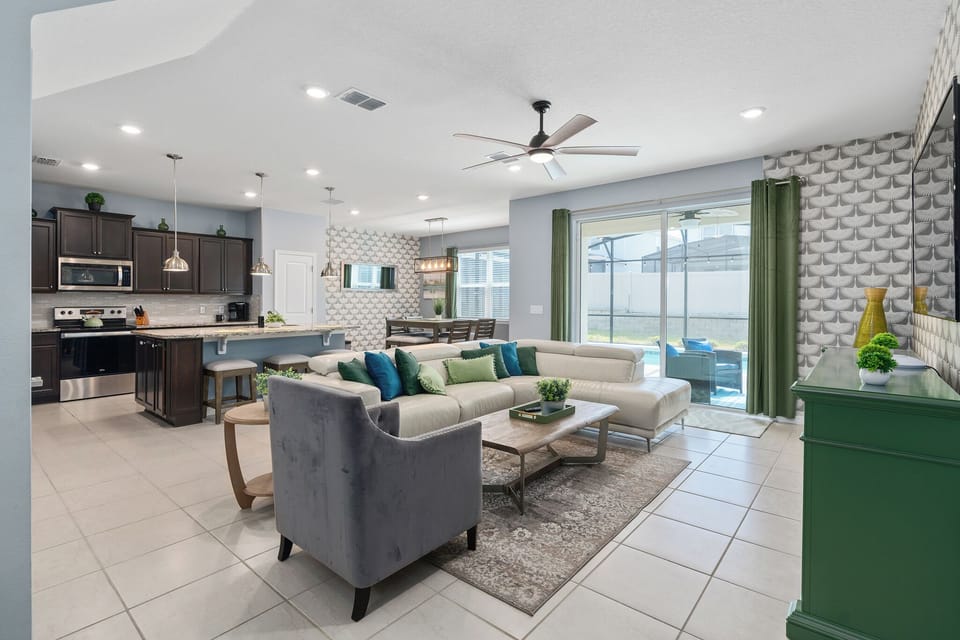 Open floor plan with backyard pool