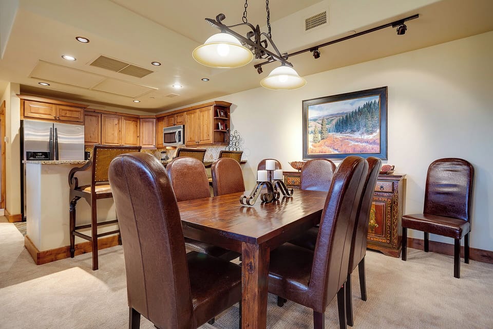 Gather around your elegant dining table for memorable meals, with a fully equipped kitchen ready for your culinary adventures.