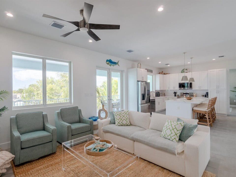 Open concept living room & kitchen for entertaining.