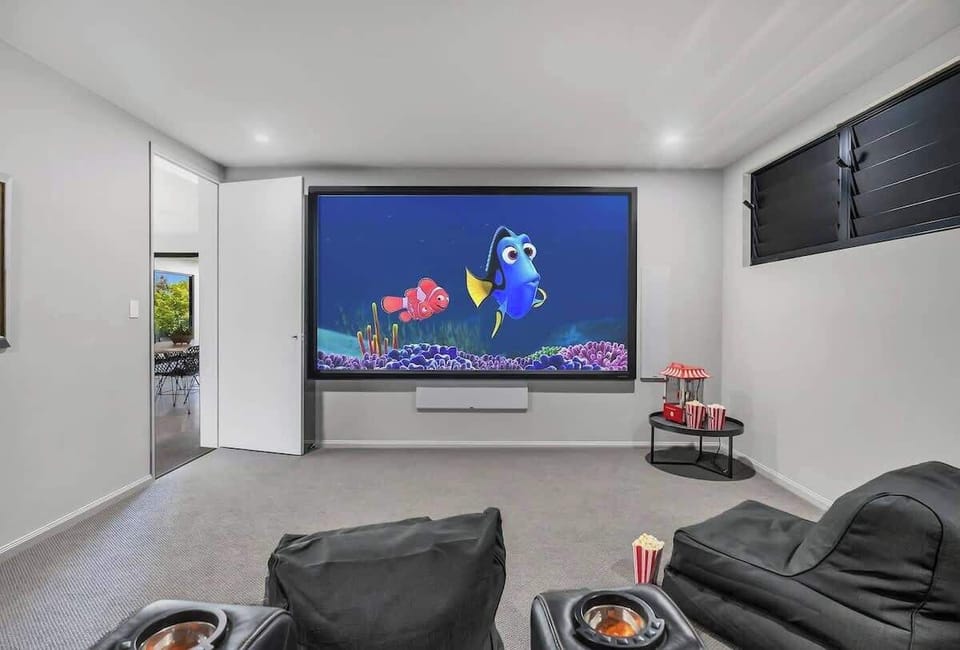 Your private cinema awaits! Recline in plush leather seats, grab some popcorn, and enjoy movie nights on the big screen.